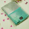 Seetha Silver Semi Tissue Silk Saree with Sea Green Zari Border