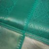 Seetha Silver Semi Tissue Silk Saree with Sea Green Zari Border