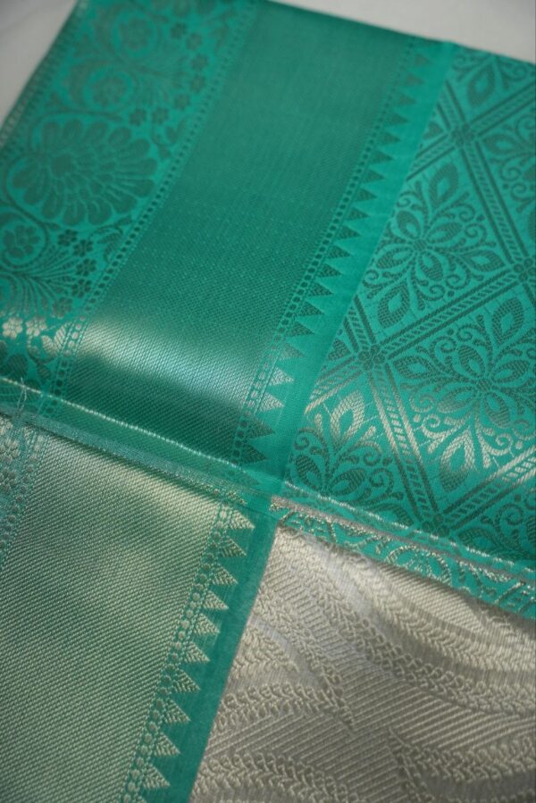 Seetha Silver Semi Tissue Silk Saree with Sea Green Zari Border